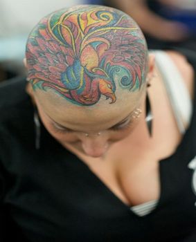 head on colorful peacock tattoo 1