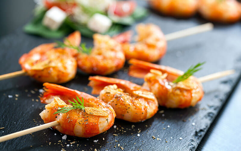Shrimp Skewers and Veggies that could be included in a Paleo Diet Plan