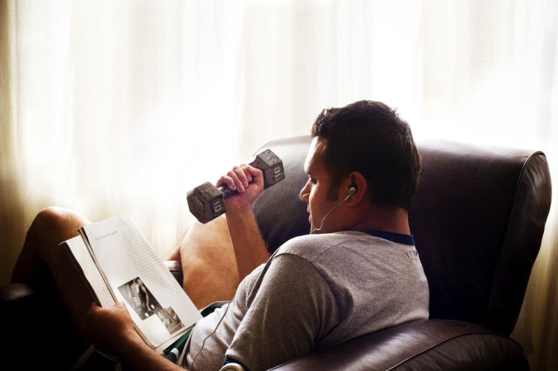 Man Reading a Muscle Magazine
