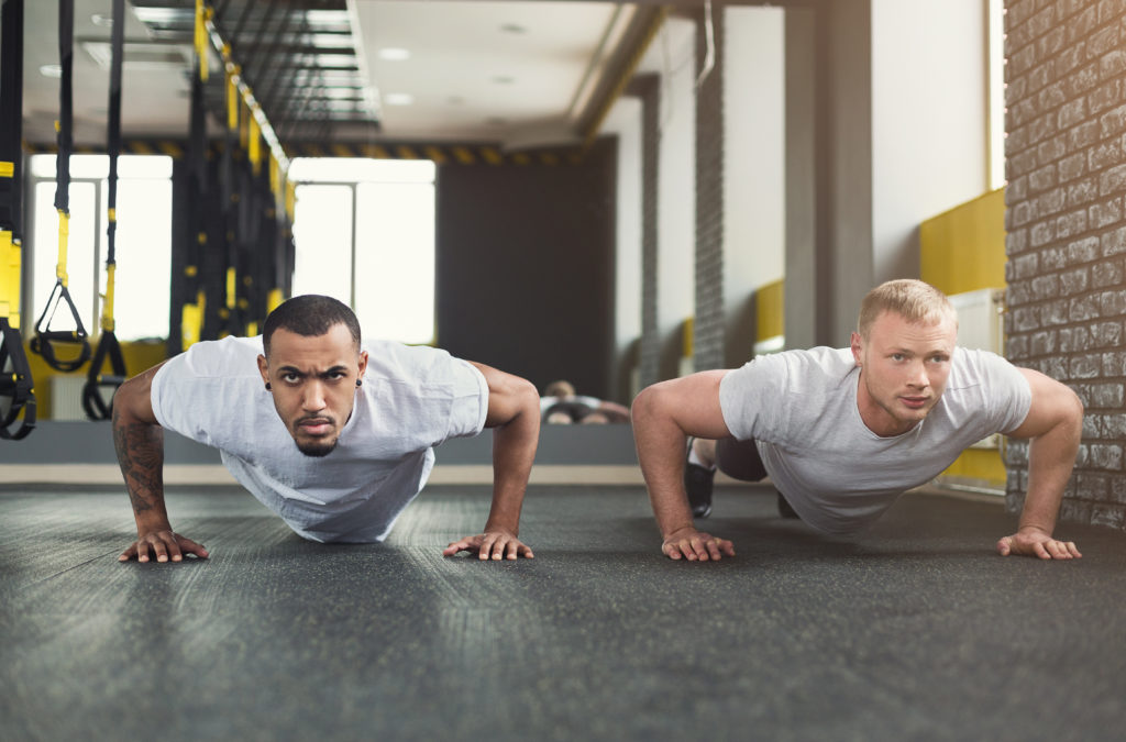 gym partners training in a gym gym partners training in a gym